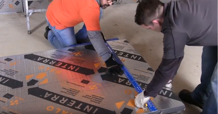 two male construction workers measuring Halo® Interra® before installation